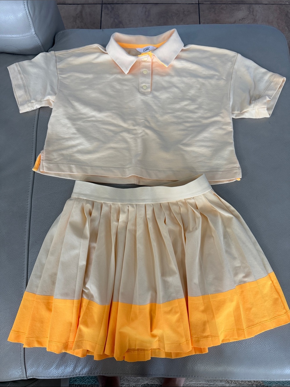 Athleta Girl creamy yellow Athletic Skirt Set with bright Yellow Accents